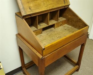Can't you see hands placing letters, writing materials, and treasures inside this well-designed desk!