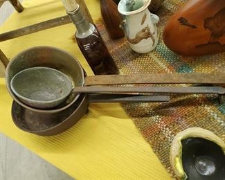 Two vintage dippers and a old campfire skillet
