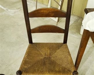 This Chair is lovely!  The seat thatch work is pristine!