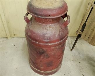 A Milk Can and it  is Red!