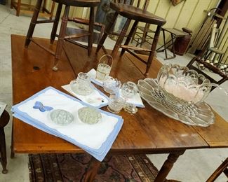 This table has two drop leaves and six lovely chairs