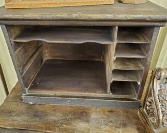 Antique Letter Box that sets on a table.
