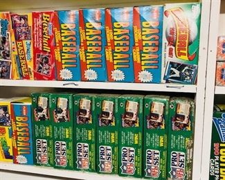 Boxes of Football/Baseball/NBA/NHL Cards.
