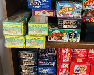 Boxes of Football/Baseball/NBA/NHL Cards.