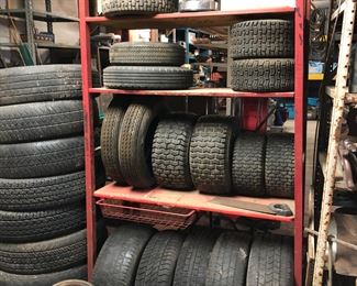 Large Tire Rack and Tires.