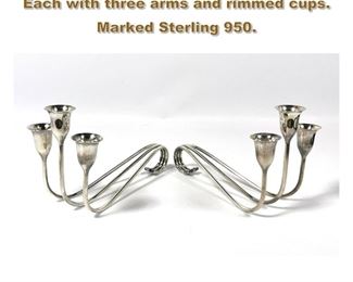 Lot 1720 Pr Modernist Sterling candle sticks. Each with three arms and rimmed cups. Marked Sterling 950. 