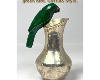 Lot 1722 Silver plate pitcher tessellated green bird. Castillo Style.