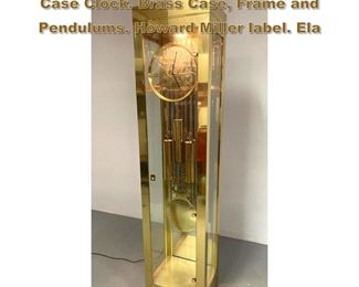 Lot 1770 HOWARD MILLER Brass Glass Tall Case Clock. Brass Case, Frame and Pendulums. Howard Miller label. Ela