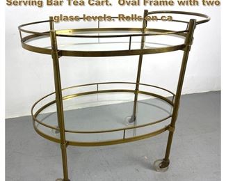 Lot 1782 Italian Brass and Glass Rolling Serving Bar Tea Cart. Oval Frame with two glass levels. Rolls on ca