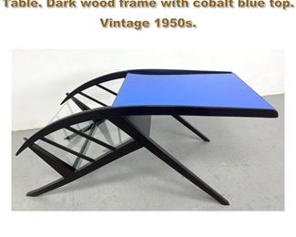 Lot 1799 Modernist Italian style Coffee Table. Dark wood frame with cobalt blue top. Vintage 1950s.