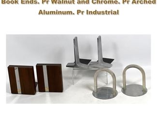Lot 1801 Collection of Mid Century Modern Book Ends. Pr Walnut and Chrome. Pr Arched Aluminum. Pr Industrial 
