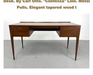Lot 1834 HEYWOOD WAKEFIELD Modernist Desk. By Carl Otto. Contessa Line. Metal Pulls. Elegant tapered wood l