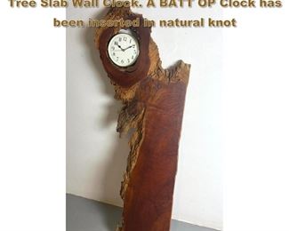 Lot 1884 Studio Wood Worker Live Edge Tree Slab Wall Clock. A BATT OP Clock has been inserted in natural knot