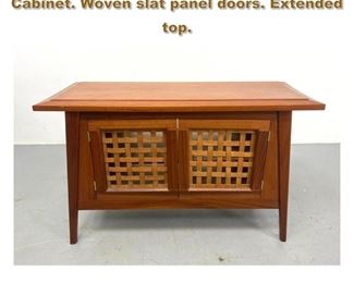 Lot 1983 Arts and Crafts Cherry Two Door Cabinet. Woven slat panel doors. Extended top. 