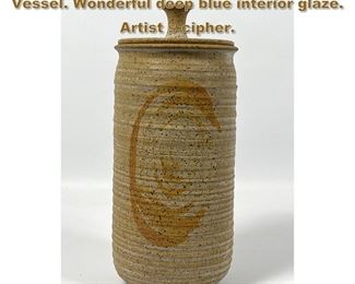 Lot 1989 Tall Cylindrical Lidded Art Pottery Vessel. Wonderful deep blue interior glaze. Artist s cipher. 