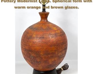Lot 2001 THE FELDMAN Co Large Art Pottery Modernist Lamp. Spherical form with warm orange and brown glazes. 