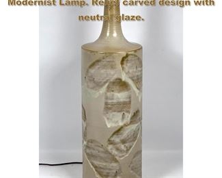 Lot 2029 Tall Art Pottery Bottle Form Modernist Lamp. Relief carved design with neutral glaze. 