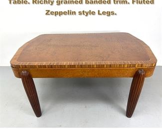 Lot 2064 French Art Deco Burl Wood Dining Table. Richly grained banded trim. Fluted Zeppelin style Legs. 