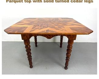Lot 2070 Folk art center table. Cedar Parquet top with solid turned cedar legs