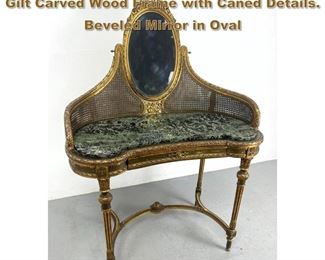 Lot 2077 antique French Marble Top Vanity. Gilt Carved Wood Frame with Caned Details. Beveled Mirror in Oval 