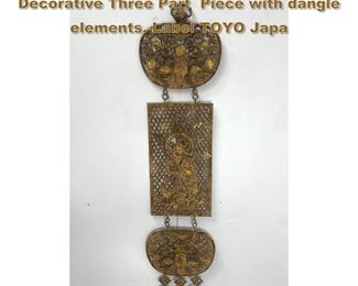 Lot 2087 Gilt Pierced Metal Wall Hanging. Decorative Three Part Piece with dangle elements. Label TOYO Japa