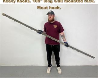 Lot 2131 Industrial Metal Bar with large heavy hooks. 108 long wall mounted rack. Meat hook. 