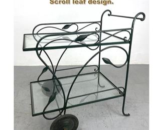 Lot 2149 Fancy Wrought iron bar cart Sever. Scroll leaf design.