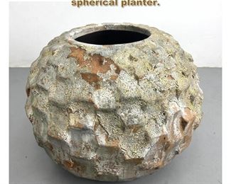 Lot 2158 Huge terra cotta dimpled spherical planter. 