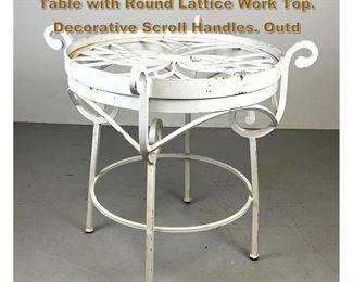 Lot 2165 Vintage Outdoor Iron Patio Table. Table with Round Lattice Work Top. Decorative Scroll Handles. Outd