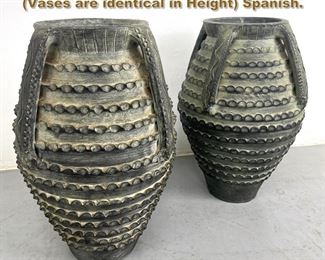 Lot 2192 Pair Black Carved Pottery vases. Vases are identical in Height Spanish. 