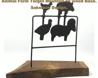 Lot 2241 Found Object Sculpture. Iron Animal Form Target Mounted on wood Base. Sakelson Design. 