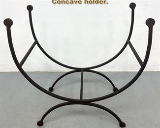 Lot 2247 Modernist Iron Log Holder. Concave holder. 