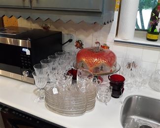 Crystal stemware, Fostoria luncheon/tea sets, hand painted cake stand, ruby red punch cups, and crystal bride's basket.