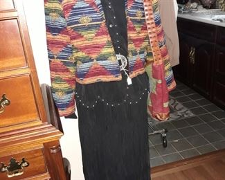 A whole rack of ladies western outfits from Double D Ranch, Ralph Lauren and more. Belts from many designers including the Brighton concho belt seen here.