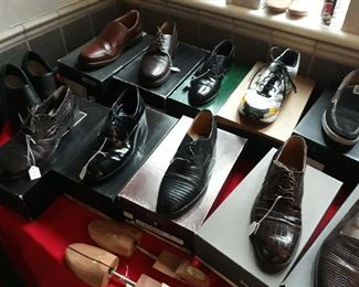 Many men's designer dress and casual shoes.