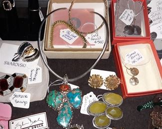 Costume and sterling silver jewelry by many designers.