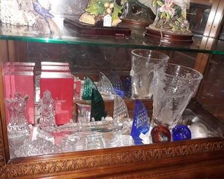 Waterford, Lalique, and Glass Eye Studios.