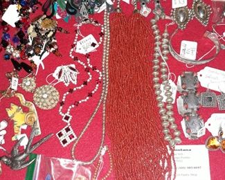 Vintage costume jewelry including St. John earrings.