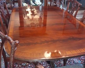 Heirloom Heritage dining table with two leaves and custom pad.