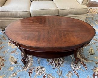 Wood oval coffee table 48" x 30" x 19"H