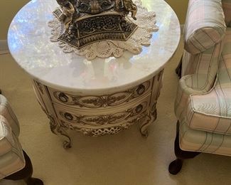 Round carrara marble table.