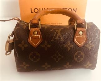 LUOIS VUITTON MINI SPEEDY