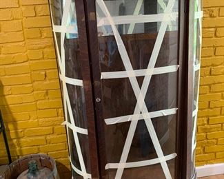 Antique China cabinet.  Mahogany with glass front.  Taped for transport only, not broken.  Shelves included.
