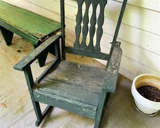 Nice porch rocker with green paint