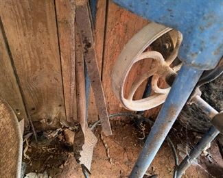 Blacksmith tools hanging on the side