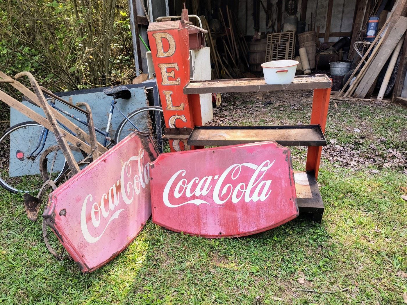 1940s Coke porcelain signs and Delco battery display