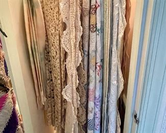 Collection of antique hand-made quilts.