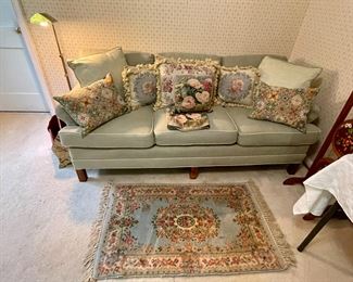 Beautiful selection of hand-made needlepointed pillows.