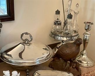 More silver-plated serving pieces.