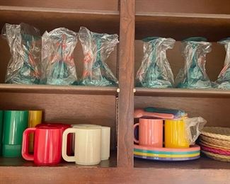 Plastic tumblers, mugs, plates & new marg glasses.